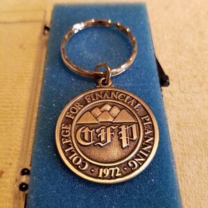 Vintage College of Financial Planning brass finish Keychain 1972